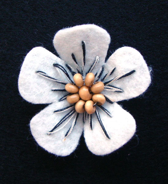 fiorellino lenci con perle legno e ricamo - col. Azzurro